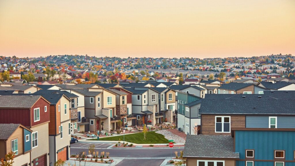 Residential community with modern homes at sunrise