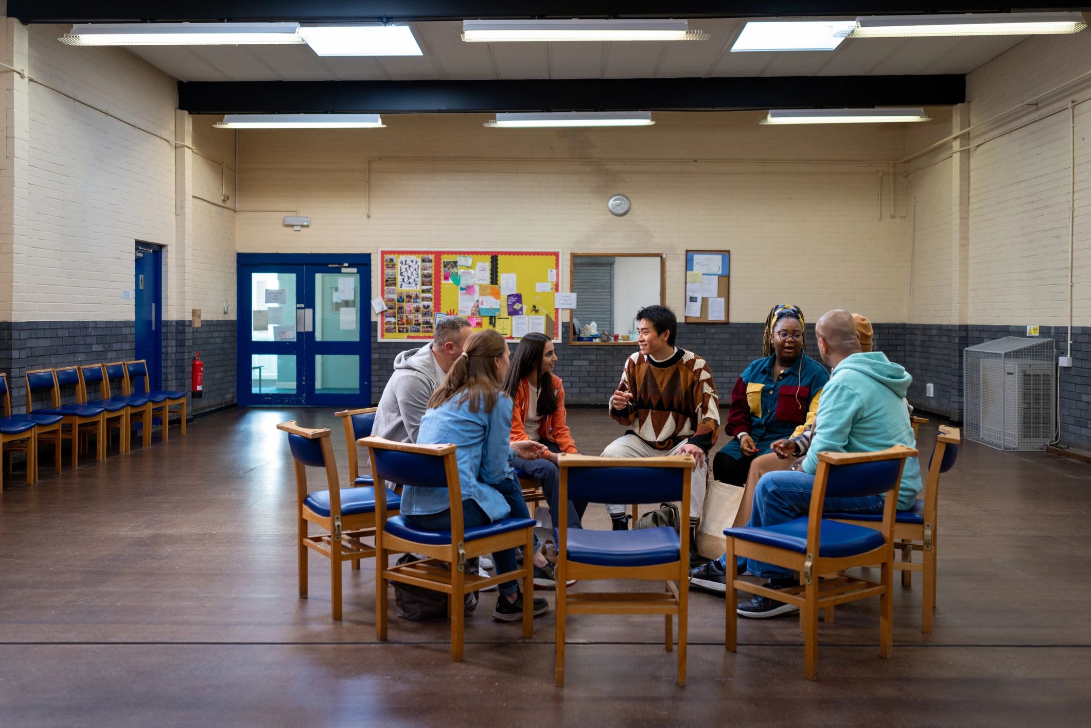 Community members discussing concerns in a meeting